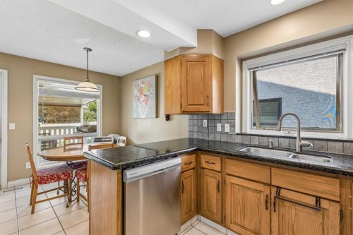 684 Sunmills Drive Se, Calgary, AB - Indoor Photo Showing Kitchen With Double Sink
