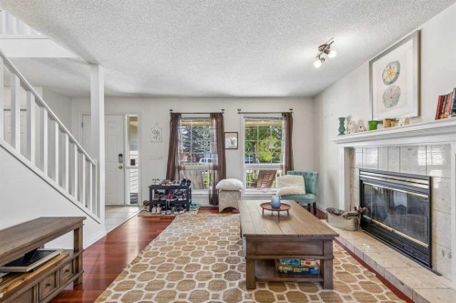 684 Sunmills Drive Se, Calgary, AB - Indoor Photo Showing Living Room With Fireplace