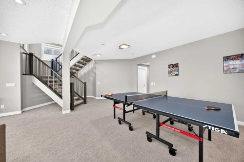 33 Aspen Summit Circle Sw, Calgary, AB - Indoor Photo Showing Other Room