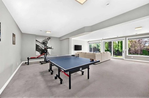33 Aspen Summit Circle Sw, Calgary, AB - Indoor Photo Showing Other Room
