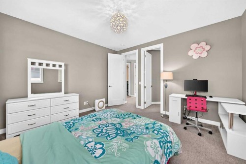33 Aspen Summit Circle Sw, Calgary, AB - Indoor Photo Showing Bedroom