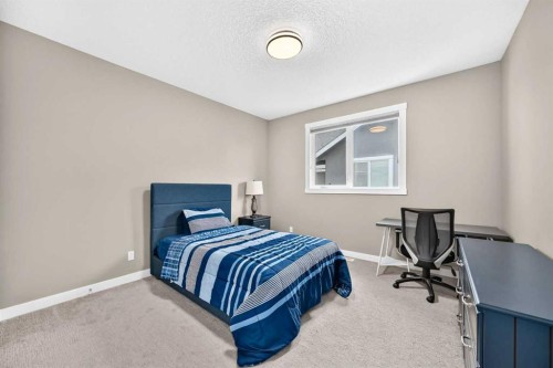 33 Aspen Summit Circle Sw, Calgary, AB - Indoor Photo Showing Bedroom