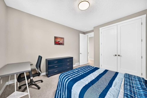 33 Aspen Summit Circle Sw, Calgary, AB - Indoor Photo Showing Bedroom