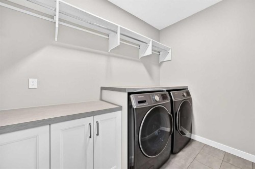 33 Aspen Summit Circle Sw, Calgary, AB - Indoor Photo Showing Laundry Room