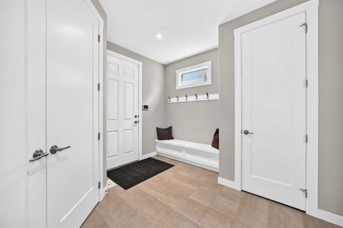 33 Aspen Summit Circle Sw, Calgary, AB - Indoor Photo Showing Other Room