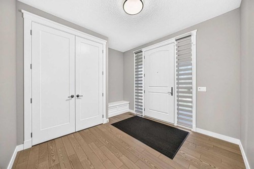 33 Aspen Summit Circle Sw, Calgary, AB - Indoor Photo Showing Other Room
