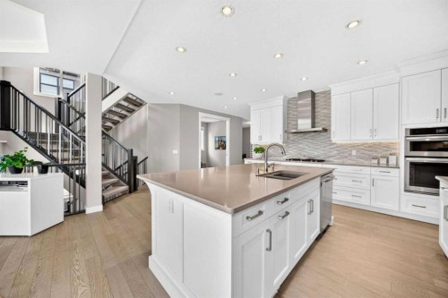 33 Aspen Summit Circle Sw, Calgary, AB - Indoor Photo Showing Kitchen With Double Sink With Upgraded Kitchen