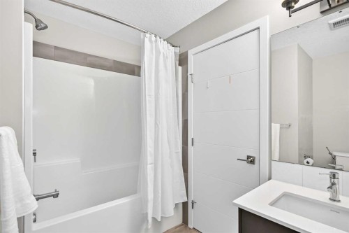 203-120 Redstone Walk Ne, Calgary, AB - Indoor Photo Showing Bathroom