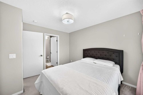203-120 Redstone Walk Ne, Calgary, AB - Indoor Photo Showing Bedroom