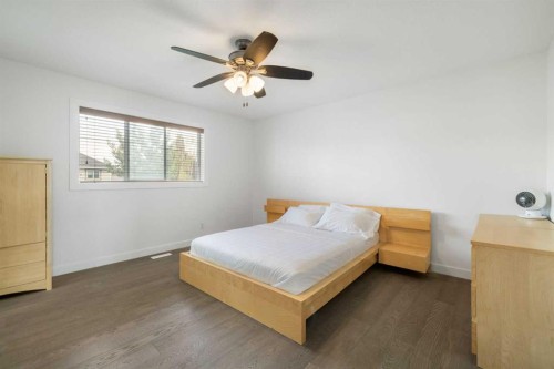 56 West Cedar Rise Sw, Calgary, AB - Indoor Photo Showing Bedroom