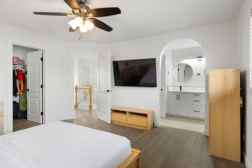 56 West Cedar Rise Sw, Calgary, AB - Indoor Photo Showing Bedroom