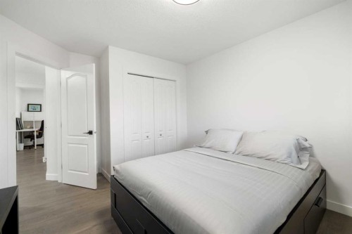 56 West Cedar Rise Sw, Calgary, AB - Indoor Photo Showing Bedroom