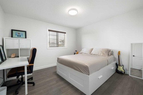 56 West Cedar Rise Sw, Calgary, AB - Indoor Photo Showing Bedroom