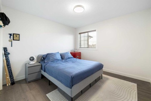 56 West Cedar Rise Sw, Calgary, AB - Indoor Photo Showing Bedroom