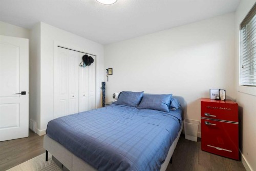 56 West Cedar Rise Sw, Calgary, AB - Indoor Photo Showing Bedroom