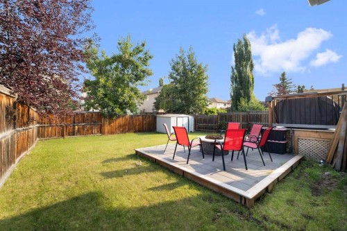 56 West Cedar Rise Sw, Calgary, AB - Outdoor With Deck Patio Veranda With Backyard