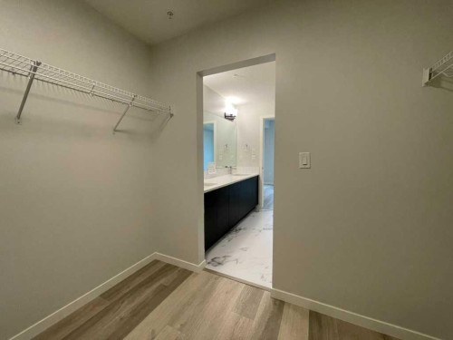 2304-42 Cranbrook Gardens Se, Calgary, AB - Indoor With Storage