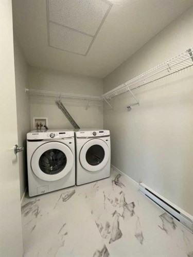 2304-42 Cranbrook Gardens Se, Calgary, AB - Indoor Photo Showing Laundry Room