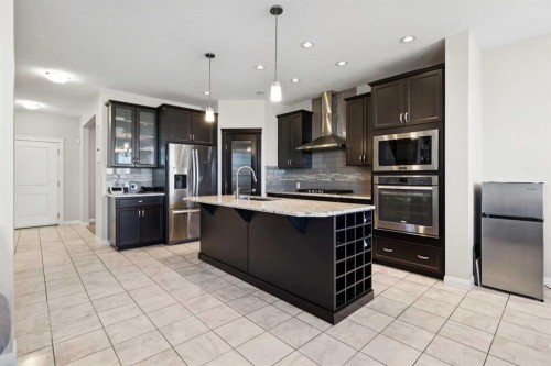215 Redstone Heights Ne, Calgary, AB - Indoor Photo Showing Kitchen With Stainless Steel Kitchen With Upgraded Kitchen