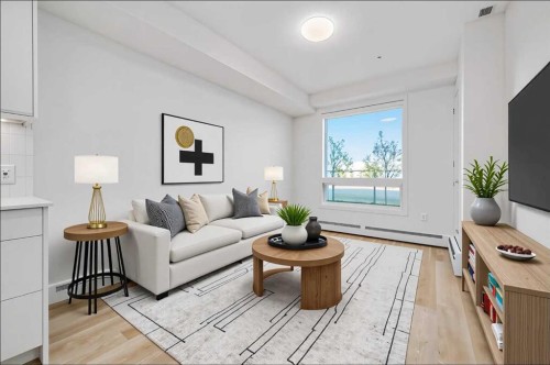 2109-8500 19 Avenue Se, Calgary, AB - Indoor Photo Showing Living Room