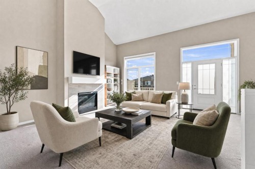 142 Yorkstone Way Sw, Calgary, AB - Indoor Photo Showing Living Room With Fireplace