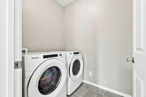 142 Yorkstone Way Sw, Calgary, AB - Indoor Photo Showing Laundry Room
