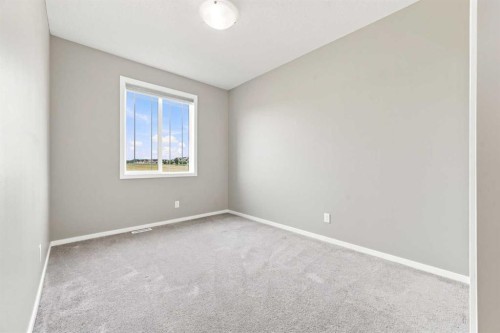 142 Yorkstone Way Sw, Calgary, AB - Indoor Photo Showing Other Room