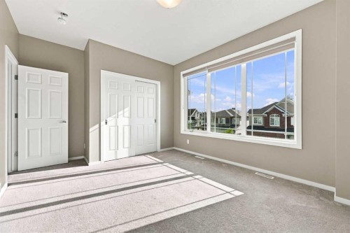 142 Yorkstone Way Sw, Calgary, AB - Indoor Photo Showing Other Room