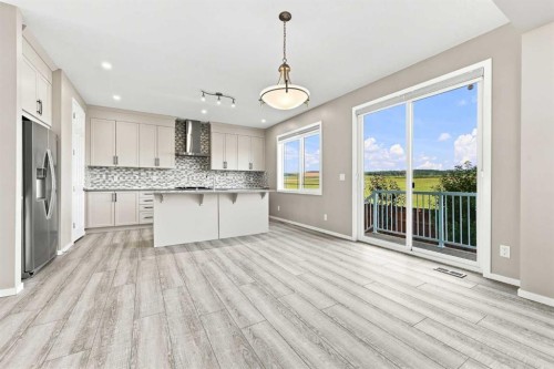 142 Yorkstone Way Sw, Calgary, AB - Indoor Photo Showing Kitchen With Upgraded Kitchen