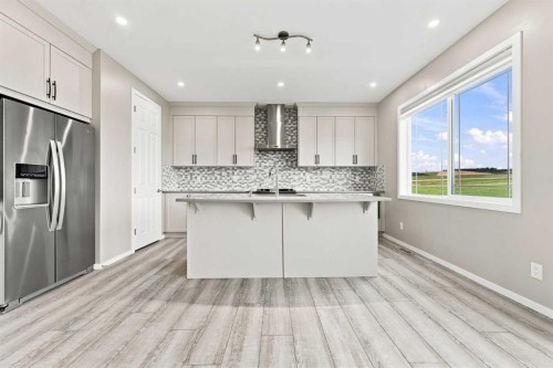 142 Yorkstone Way Sw, Calgary, AB - Indoor Photo Showing Kitchen With Upgraded Kitchen