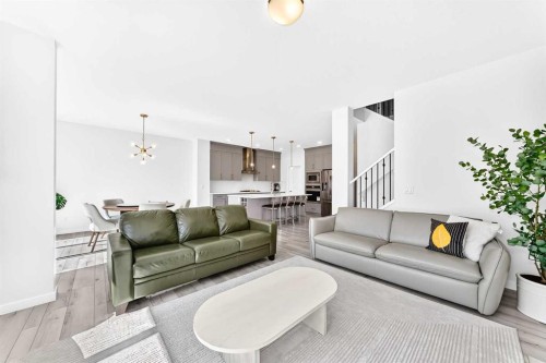 105 Magnolia Manor Se, Calgary, AB - Indoor Photo Showing Living Room