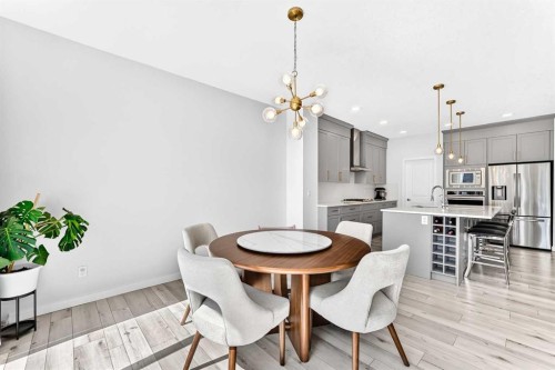 105 Magnolia Manor Se, Calgary, AB - Indoor Photo Showing Dining Room