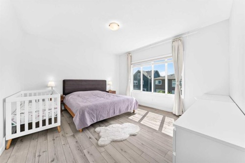 105 Magnolia Manor Se, Calgary, AB - Indoor Photo Showing Bedroom