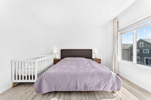 105 Magnolia Manor Se, Calgary, AB - Indoor Photo Showing Bedroom