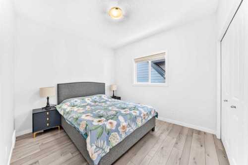 105 Magnolia Manor Se, Calgary, AB - Indoor Photo Showing Bedroom