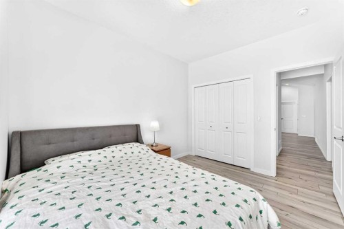 105 Magnolia Manor Se, Calgary, AB - Indoor Photo Showing Bedroom