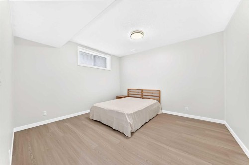 105 Magnolia Manor Se, Calgary, AB - Indoor Photo Showing Bedroom
