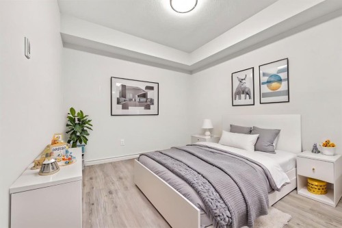 204-304 Cranberry Park Se, Calgary, AB - Indoor Photo Showing Bedroom