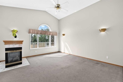 2917 Signal Hill Heights Sw, Calgary, AB - Indoor With Fireplace