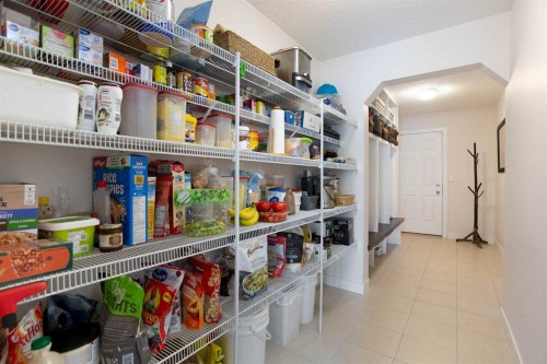2 Kingston View Se, Airdrie, AB - Indoor With Storage