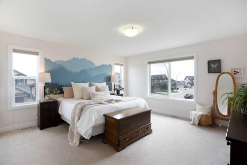 2 Kingston View Se, Airdrie, AB - Indoor Photo Showing Bedroom