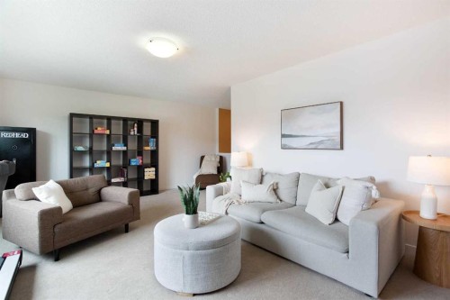 2 Kingston View Se, Airdrie, AB - Indoor Photo Showing Living Room