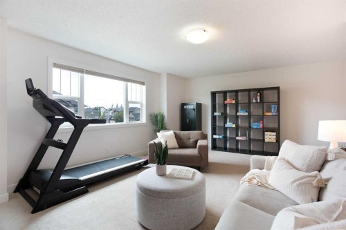 2 Kingston View Se, Airdrie, AB - Indoor Photo Showing Living Room