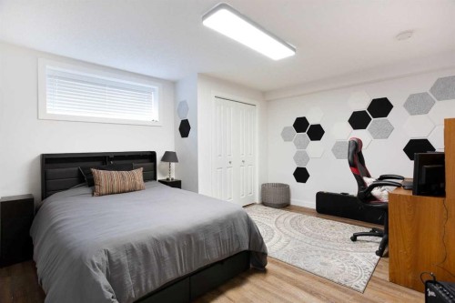 2 Kingston View Se, Airdrie, AB - Indoor Photo Showing Bedroom