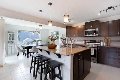 2 Kingston View Se, Airdrie, AB - Indoor Photo Showing Kitchen With Upgraded Kitchen