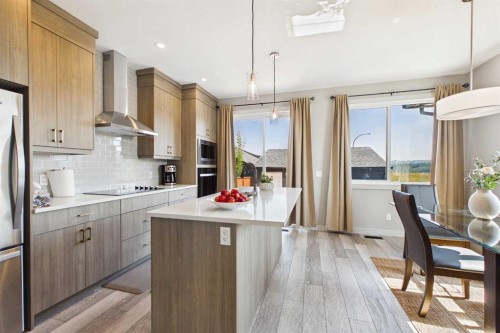 182 Rowley Gate Nw, Calgary, AB - Indoor Photo Showing Kitchen With Upgraded Kitchen
