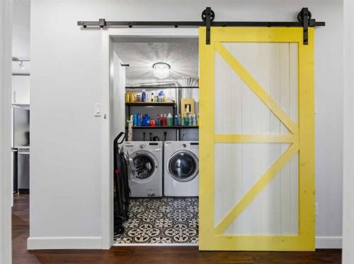 703-537 14 Avenue Sw, Calgary, AB - Indoor Photo Showing Laundry Room