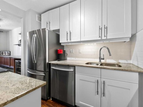 703-537 14 Avenue Sw, Calgary, AB - Indoor Photo Showing Kitchen With Stainless Steel Kitchen With Double Sink With Upgraded Kitchen