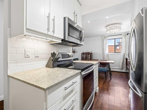703-537 14 Avenue Sw, Calgary, AB - Indoor Photo Showing Kitchen With Stainless Steel Kitchen