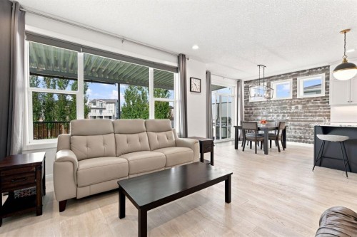 218 Boulder Creek Place, Langdon, AB - Indoor Photo Showing Living Room